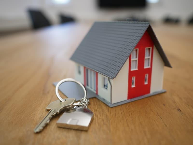 Happy family receiving keys to their new home with VisionNest